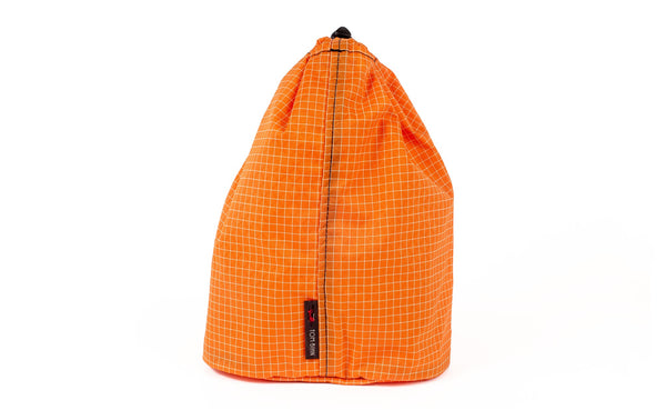 A Size 4 Zest (pale orange with white grid) 200 Halcyon Travel Stuff Sack.
